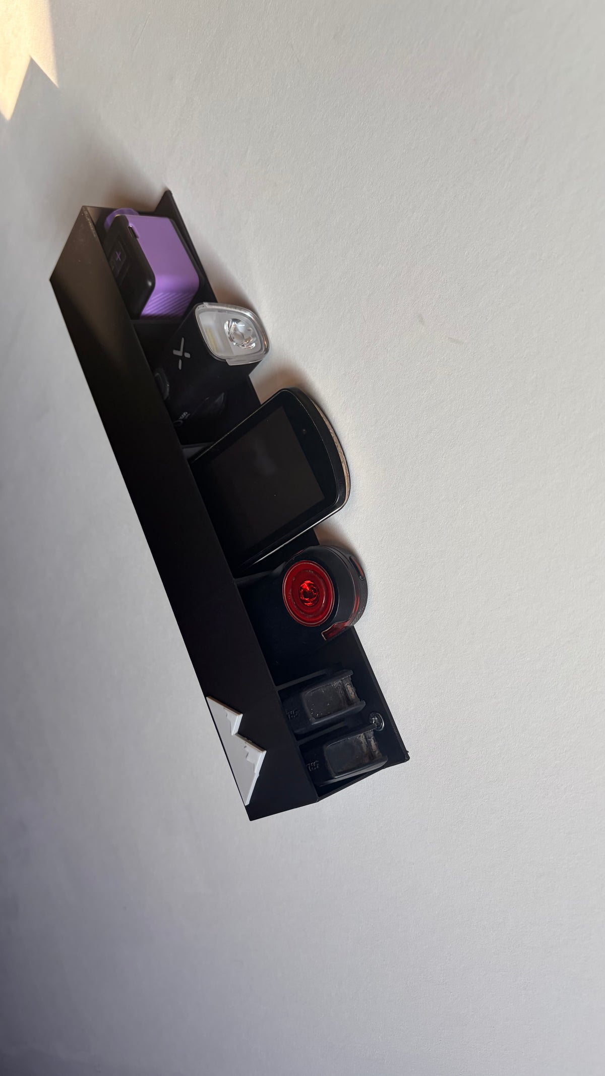 Opbergsysteem voor gps, lampen en sram accu’s